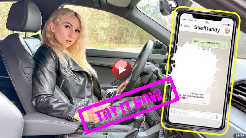 Lisa trägt eine Lederjacke und schaut entsetzt auf eine Nachricht, die sie in ihrem Auto auf ihrem Handy liest.